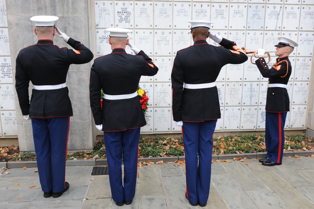 Sgt. Maj. Micheal P. Barrett, the 17th Sergeant Major of the Marine Corps, participates in a wreath laying ceremony in honor of Sgt. Maj. Clinton A. Puckett, the 6th Sergeant Major of the Marine Corps, at his columbarium in Arlington National Cemetary, Nov. 10, 2011.